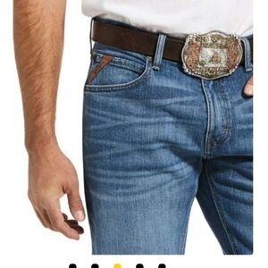 194B. Ariat Men's Relaxed Fit, Distressed Blue Jeans - 34x34